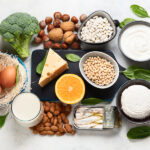 Aerial view of foods that contain healthful calcium that is important for strong teeth and bones